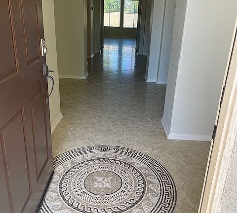 entrance with mosaic floor tile