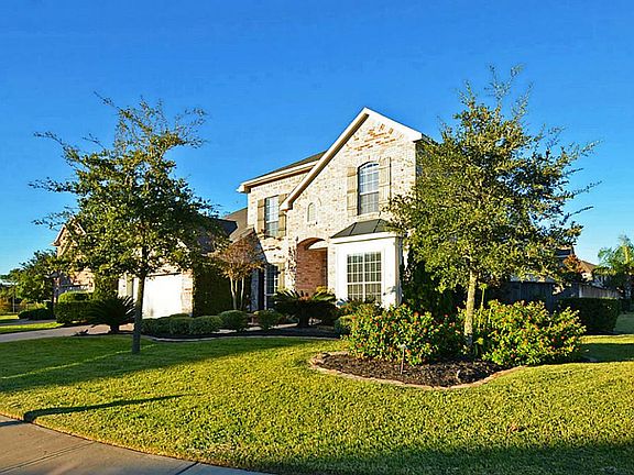 This house is situated on a corner lot - providing for outstanding curb appeal.