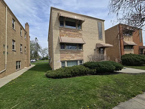 7126 W Jarvis Ave #1 Photo 1