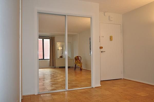 Two mirrored closets