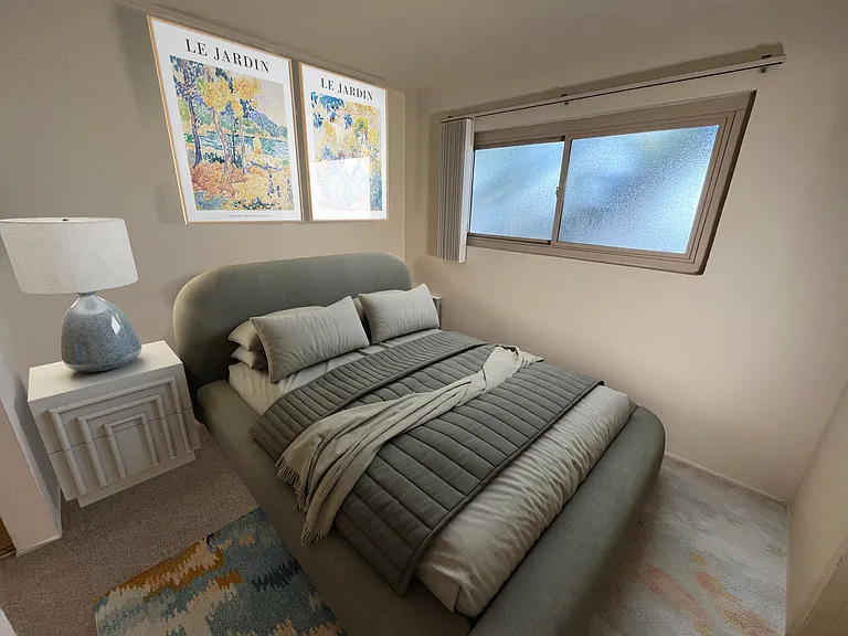 Downstairs Jr 1BR: bedroom accommodates up to a queen bed and side table. Bathroom is right off the bedroom, and large closets line the hallway nearby leading to the living room