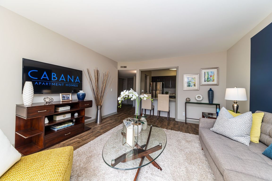 Spacious living room with hardwood-style flooring