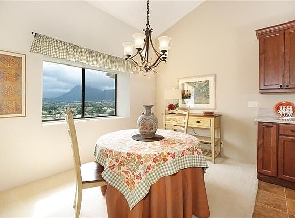 The dining room enjoys views of the Koolau Mtns.