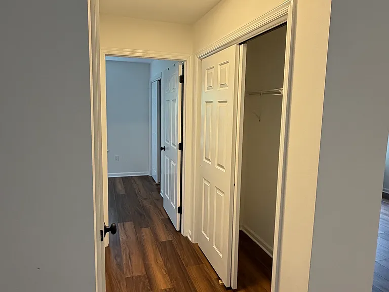 HALLWAY TO COAT CLOSET, MAIN BATH AND BR #2