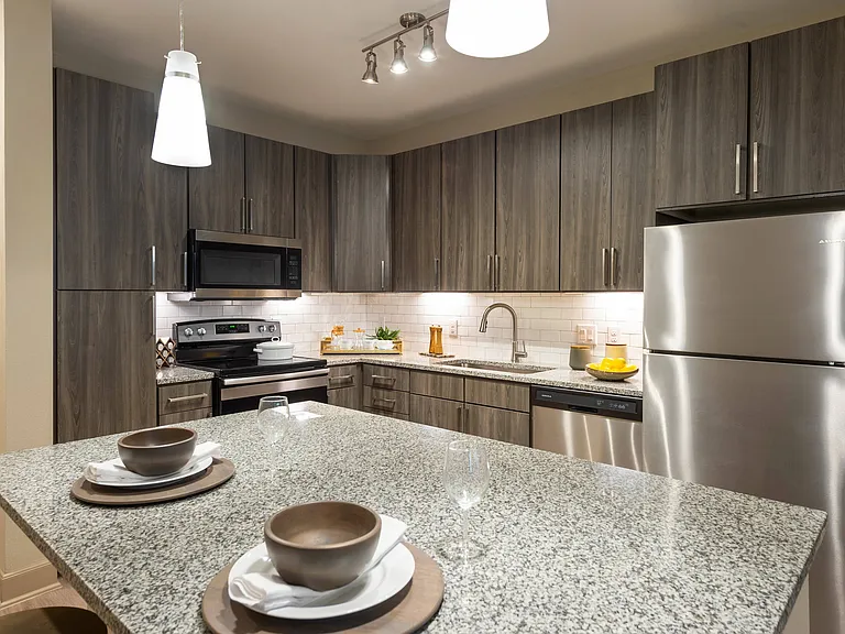 Spacious kitchens with large islands and under cabinet lighting