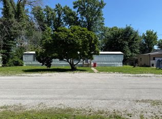 203 W 4th St, Henrietta, MO 64036