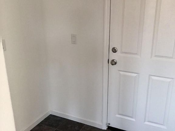 To garage, fit a desk/shelf