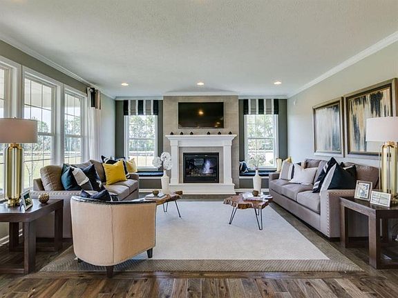 This photo is a model home photo or artist rendering due to construction stage.