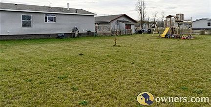 fenced in backyard and playground
