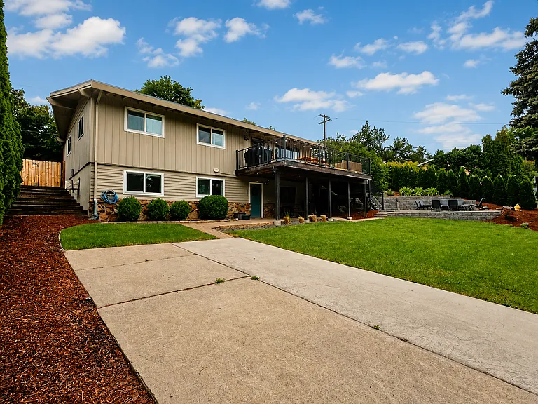 New Energy-Efficient Windows Installed - Low-Maintenance Landscaping
