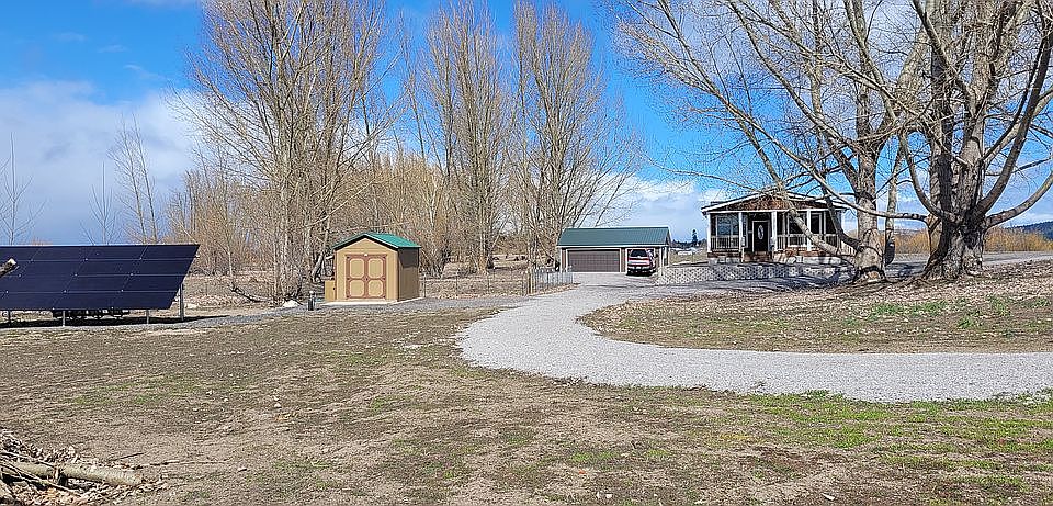 House, garage, and pumphouse