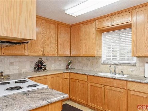 Beautiful Kitchen with newer cabinets and Granite counter tops.