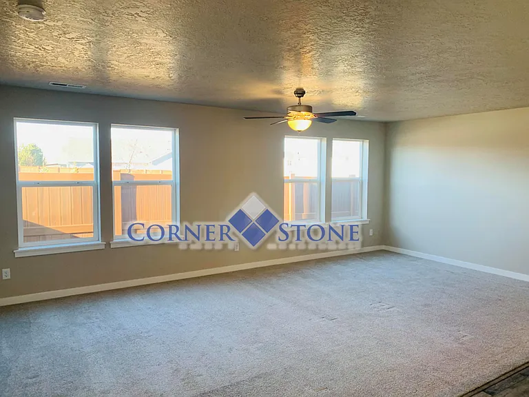 7610 S Sea Breeze Way — Photo 2
