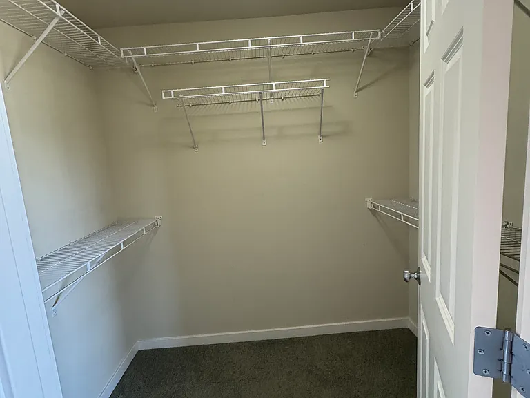 Walk-in closet inside the Master bedroom suite