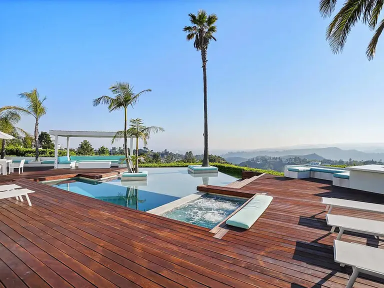 Find outdoor bliss as relaxation and entertainment seamlessly blend in this exquisite property.