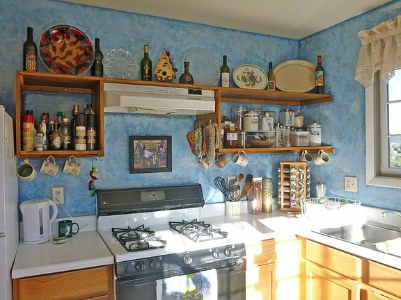 KITCHEN WITH ALL APPLIANCES, INCLUDING GAS RANGE
