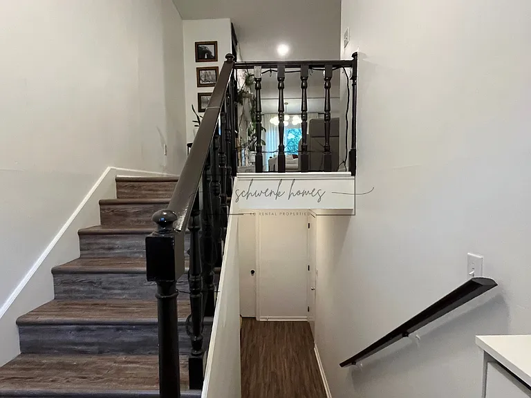 Entry and Stairs to Garage/Storage