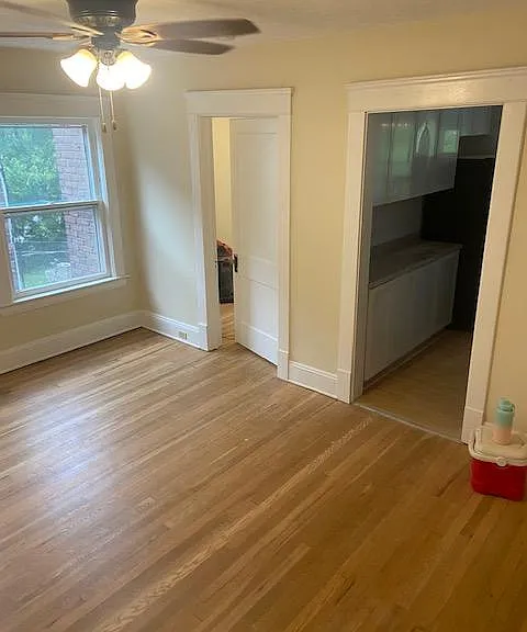 dining room facing kitchen and back bedroom
