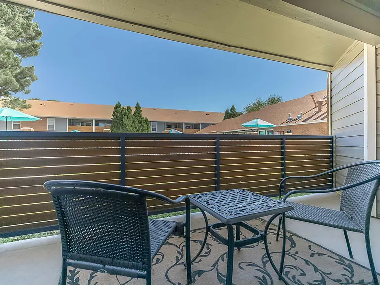 Relax on a Spacious Balcony at Wind Tree Apartments in El Paso, TX