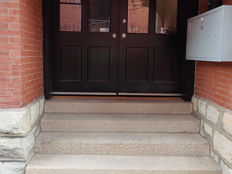 Private entrance to stairwell for 3rd floor apartments.