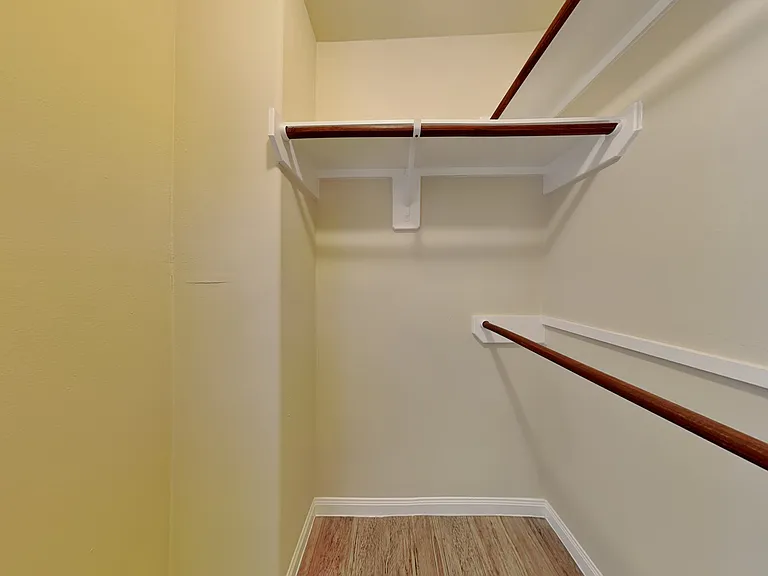 This corner closet features a