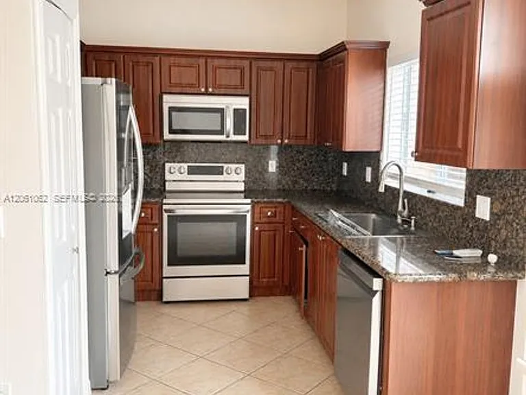 8508 NW 141st Ter #CU-501 — Photo 3
