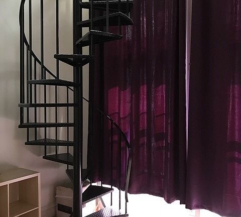 Spiral staircase to second bedroom and bath