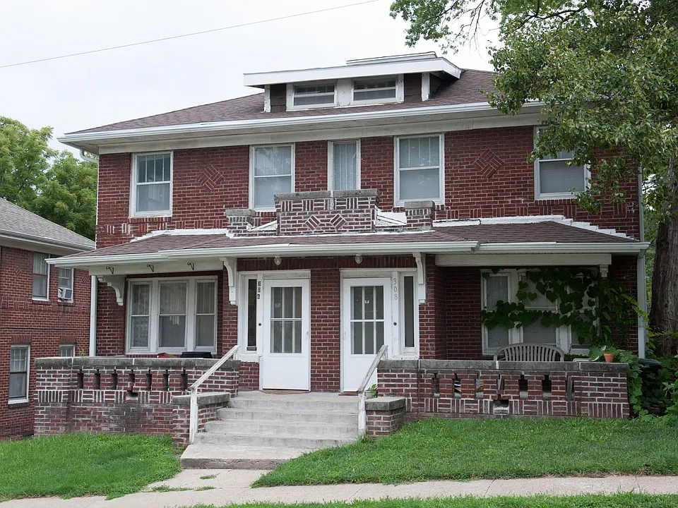 Front of duplex. 306 on the left side.