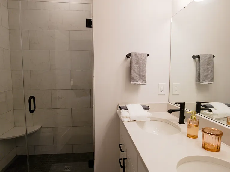 Primary bathroom with double sink vanity