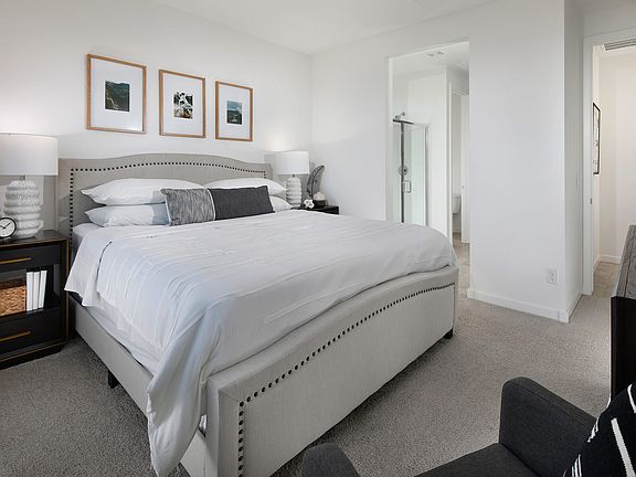 Primary Bedroom in Carson floorplan modeled at The Enclave on Olive.