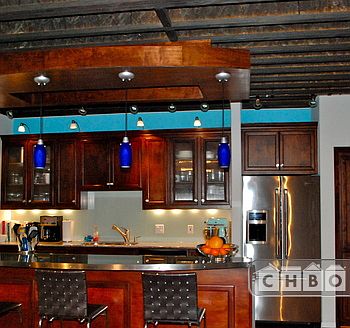 Kitchen with exposed beams (half bath and utility room off t