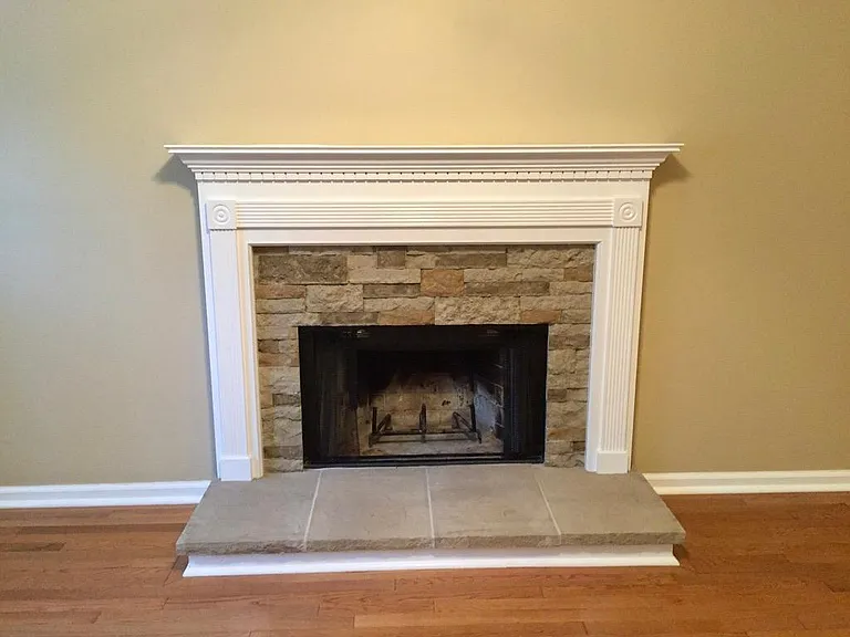 Wood burning Fireplace in living room.