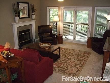 Spacious Living Area
						:
						Living area has comfy sofa , two recliners, flat screen TV and cozy fireplace
