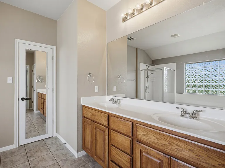 Bedroom #4 (Primary suite), with HUGE walk-in closed, a garden tub, stand in shower and double sink vanity