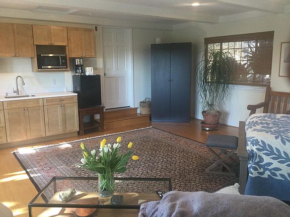 Mini-fridge in this photo has been replaced with a new larger unit; see other photos. A small gas stove/oven has now been installed (not pictured)