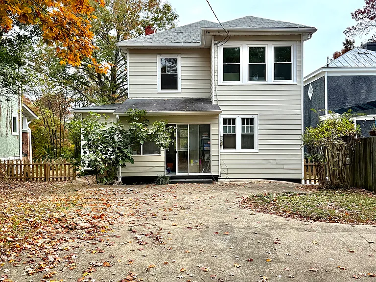 Newly painted house with huge back yard