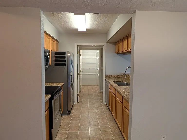 View into kitchen from dining area