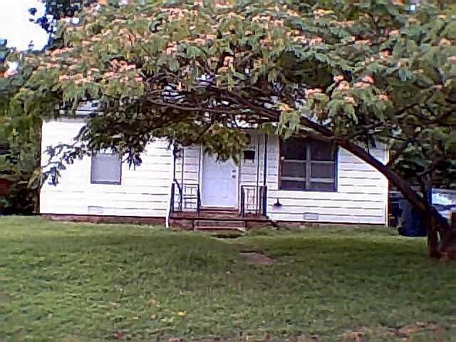 Exterior Front. Nice Curb Appeal Beautiful Tree lots of parking in drive