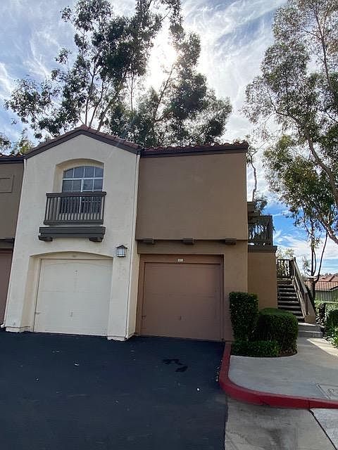 Garage on right adjacent to private steps to deck and entrance