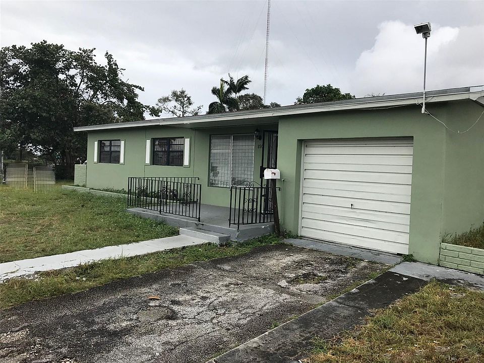 1st image of 890 NW 202nd St