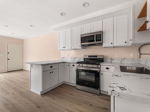 Nice open kitchen area with a large sink