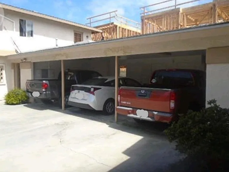 3 car carport, 1 assigned space for each apartment. Apt A has middle space