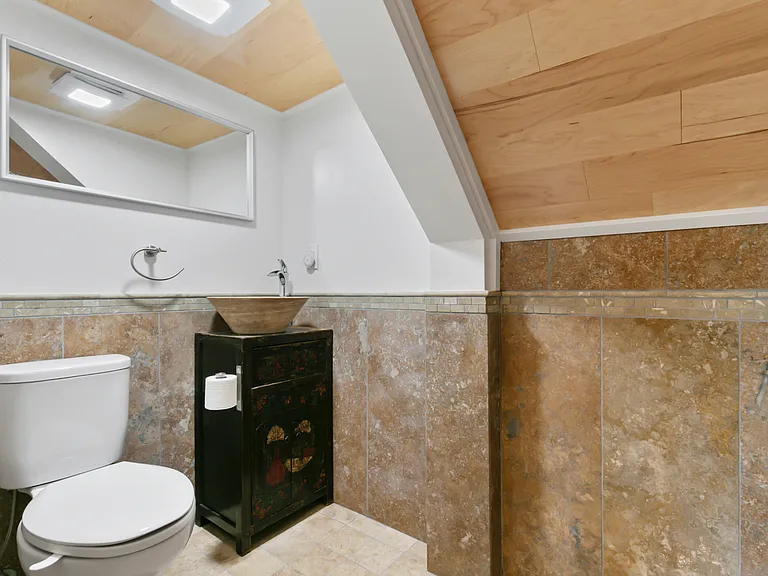 Half bath with Italian stone, Toto toilet, and 100 yo Chinese converted vanity