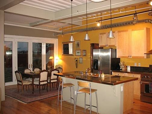 New wood floors and granite tile counters.