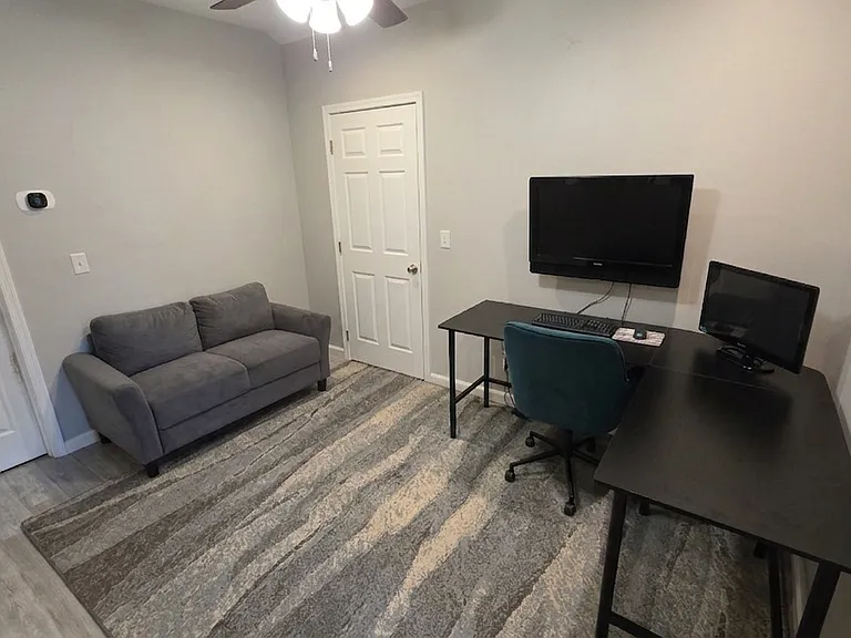 Large center area upstairs with large attic space as well