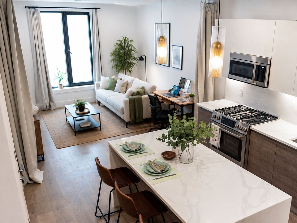 Living room has a ceiling track curtains, can be used as flexible space, could be used as a second bedroom