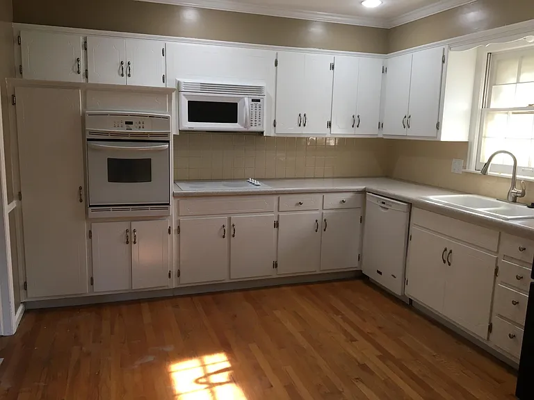 Kitchen-oven, microwave, ceramic cooktop, dishwasher, disposal and new faucet
