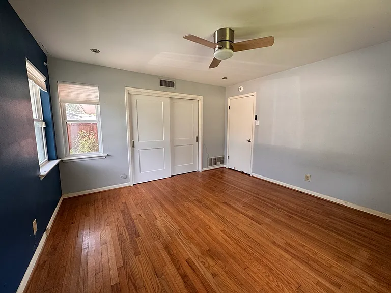 Fresh paint is actively being applied! Bedroom 2 is getting a full, premium makeover with crisp SW Gray Matters in Emerald to provide a sleek, modern finish.