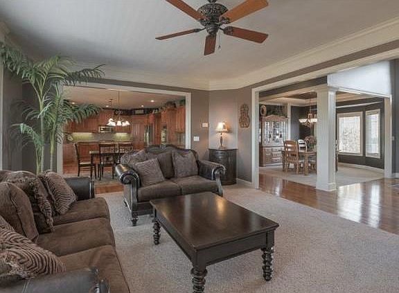 Living Room looking into Dining and Kitchen