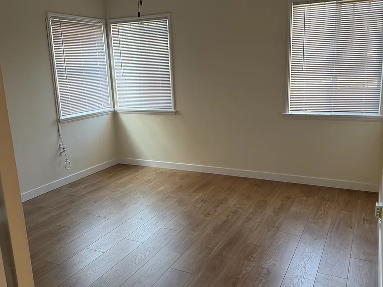 West bedroom with ceiling fan
